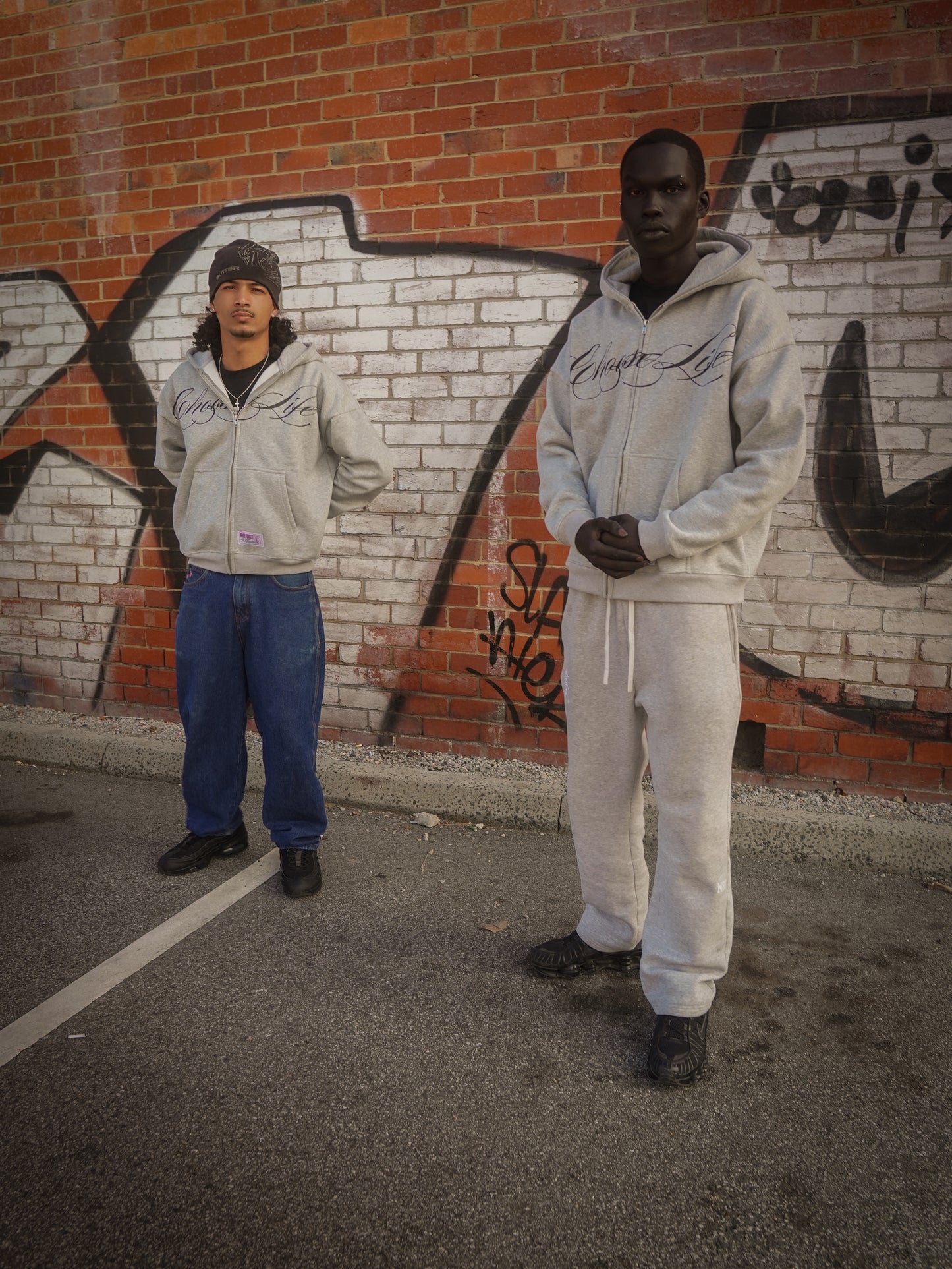 CURSIVE ZIP-UP HOODIE